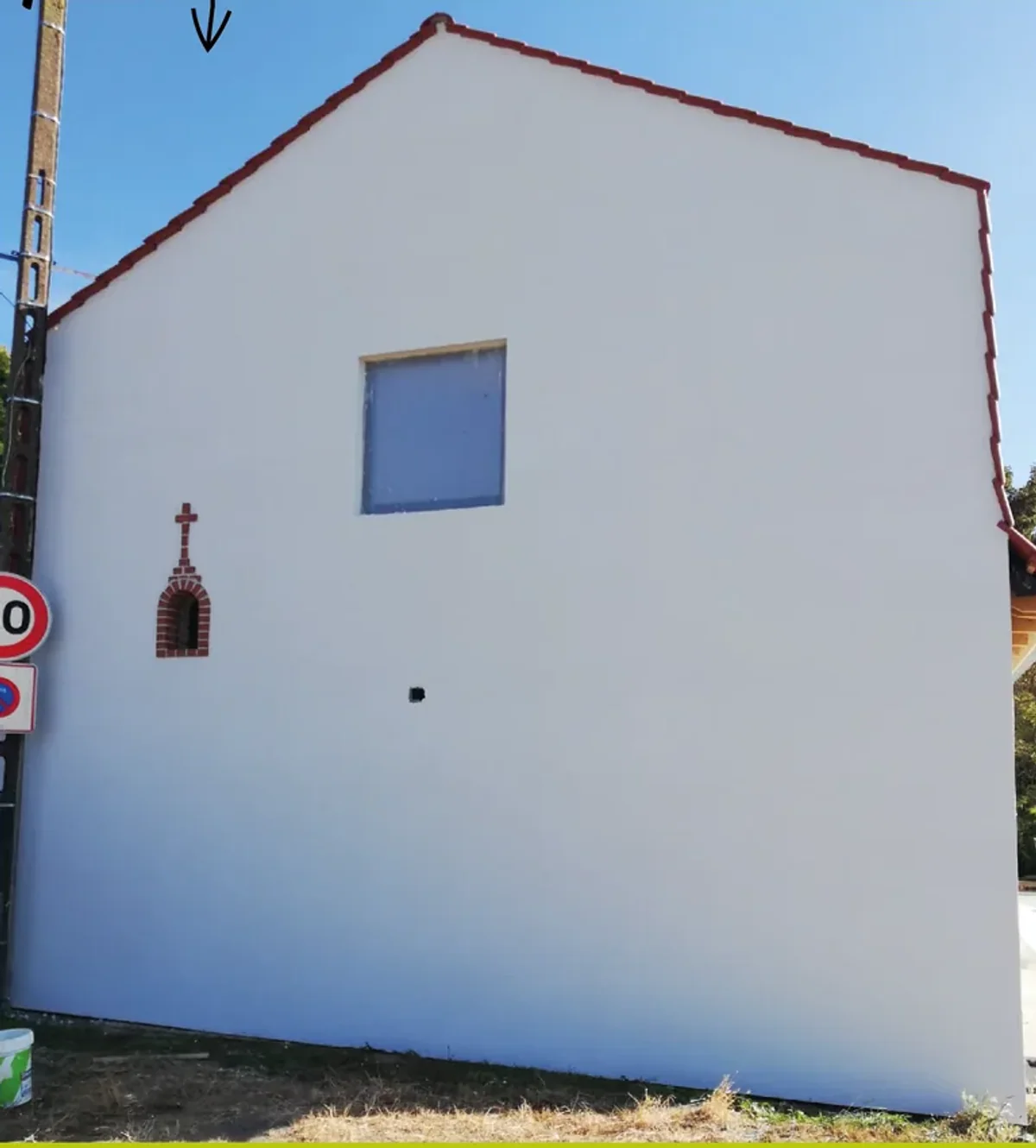 Mur pignon d’une maison après la rénovation de sa façade